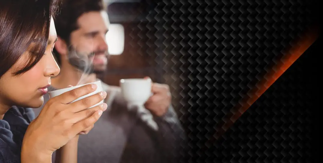 Person enjoying coffee with Java Burn supplement